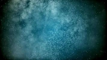 4K Little particles floating and moving in a cloud on dark blue background video