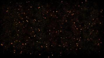 oranje zachte deeltjes die langzaam op 4 k zwarte achtergrond drijven