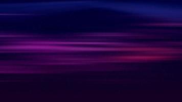 golvende kleine deeltjes drijvend op 4k achtergrond met paarse lichten video