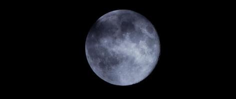  Night shot of full moon moving on sky with gray clouds in foreground in 4K video