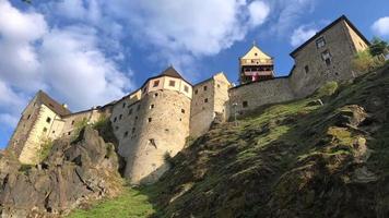 Old castle view by day from down up in 4K video