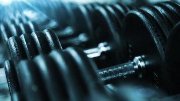 close up gym dumbbells fitness center sport video