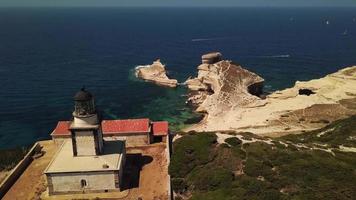 Flying towards a lighthouse 4K video