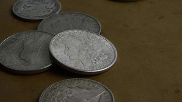 Rotating stock footage shot of antique American coins - MONEY 0064 video