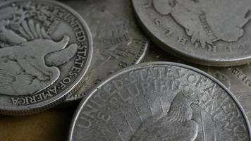 Rotating stock footage shot of antique American coins - MONEY 0099