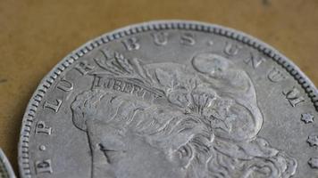 Rotating stock footage shot of antique American coins - MONEY 0082 video