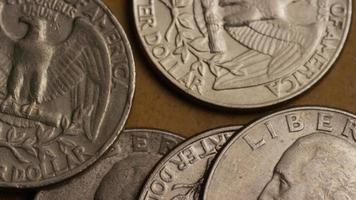 Rotating stock footage shot of American quarters coin - 0.25 - MONEY 0239 video