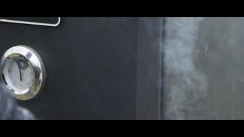 BBQ smoker with ribs inside - BBQ 007 video