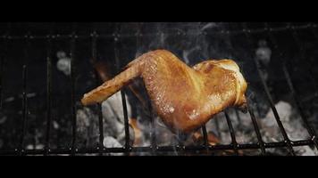 Grilling BBQ Chicken Wings on a Wood Smoked Grill - BBQ 054 video