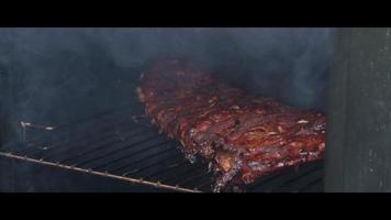 BBQ smoker with ribs inside - BBQ 010 video