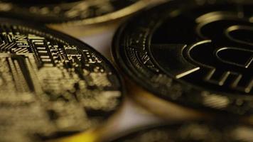 Rotating shot of Bitcoins digital cryptocurrency - BITCOIN 0375 video