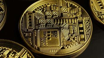 Rotating shot of Bitcoins digital cryptocurrency - BITCOIN 0064 video