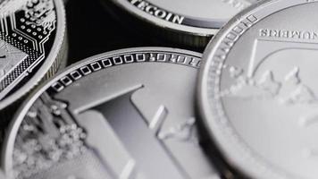 Rotating shot of Bitcoins digital cryptocurrency - BITCOIN LITECOIN 488 video