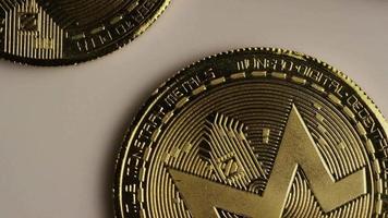 Rotating shot of Bitcoins digital cryptocurrency - BITCOIN MONERO 133 video