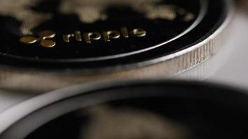 Rotating shot of Ripple Bitcoins digital cryptocurrency - BITCOIN RIPPLE 0039 video