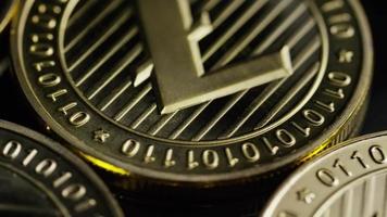 Rotating shot of Bitcoins digital cryptocurrency - BITCOIN LITECOIN 212 video