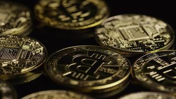 Rotating shot of Bitcoins digital cryptocurrency - BITCOIN 0524 video