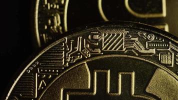 Rotating shot of Bitcoins (digital cryptocurrency) - BITCOIN 0584