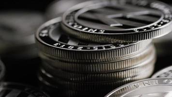 Rotating shot of Bitcoins digital cryptocurrency - BITCOIN LITECOIN 386 video