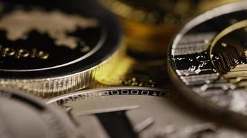 Rotating shot of Bitcoins digital cryptocurrency - BITCOIN MIXED 095 video