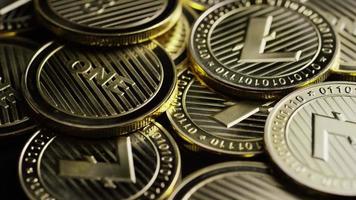 Rotating shot of Bitcoins digital cryptocurrency - BITCOIN LITECOIN 320 video