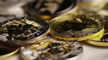 Rotating shot of Bitcoins digital cryptocurrency - BITCOIN MIXED 089 video
