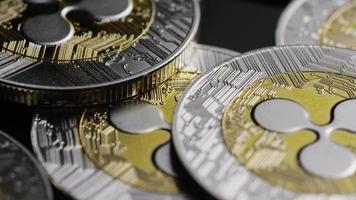 Rotating shot of Bitcoins digital cryptocurrency - BITCOIN RIPPLE 0116 video