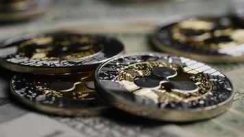 Rotating shot of Bitcoins digital cryptocurrency - BITCOIN RIPPLE 0253 video