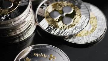 Rotating shot of Bitcoins digital cryptocurrency - BITCOIN RIPPLE 0206 video
