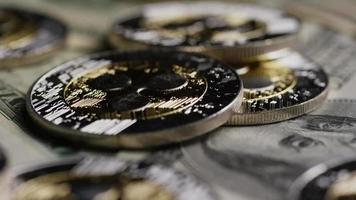 Rotating shot of Bitcoins digital cryptocurrency - BITCOIN RIPPLE 0256 video
