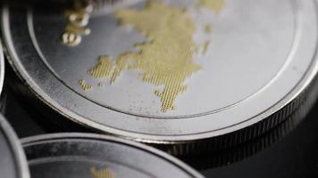Rotating shot of Bitcoins digital cryptocurrency - BITCOIN RIPPLE 0152 video