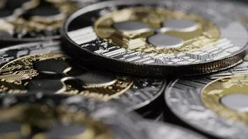 Rotating shot of Bitcoins digital cryptocurrency - BITCOIN RIPPLE 0123 video