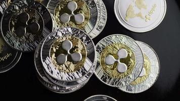 Rotating shot of Bitcoins digital cryptocurrency - BITCOIN RIPPLE 0198 video