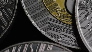 Rotating shot of Bitcoins digital cryptocurrency - BITCOIN RIPPLE 0108 video