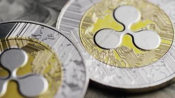 Rotating shot of Bitcoins digital cryptocurrency - BITCOIN RIPPLE 0242 video