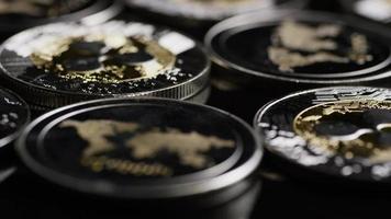 Rotating shot of Bitcoins digital cryptocurrency - BITCOIN RIPPLE 0174 video