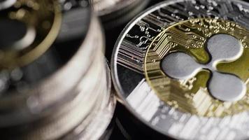 Rotating shot of Bitcoins digital cryptocurrency - BITCOIN RIPPLE 0208 video