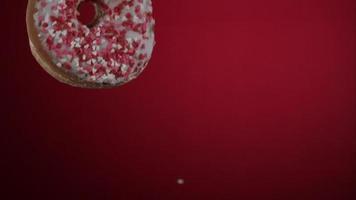 Doughnuts falling and bouncing in ultra slow motion 1,500 fps on a reflective surface - DOUGHNUTS PHANTOM 053 video