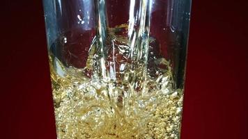 Golden colored beer pouring in ultra slow motion 1,500 fps - CHICKEN WINGS PHANTOM 011 video