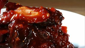 BBQ sauce pouring and splashing in ultra slow motion 1,500 fps onto BBQ ribs - BBQ PHANTOM 079 video