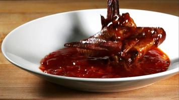 BBQ Chicken splashing in ultra slow motion 1,500 fps into BBQ sauce - BBQ PHANTOM 071 video