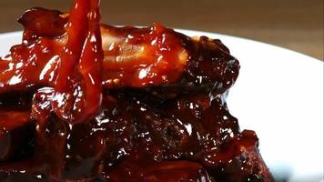 BBQ sauce pouring and splashing in ultra slow motion 1,500 fps onto BBQ ribs - BBQ PHANTOM 078 video