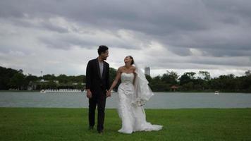 Slow motion Of Wedding Bride and groom Happy Fun in the park video