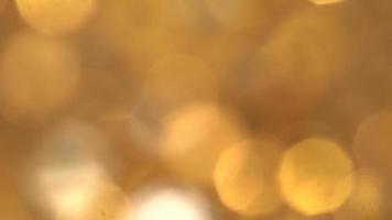 Abstract Gold bokeh lights in motion  video