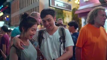 Traveler backpacker Asian couple in Bangkok, Thailand. video