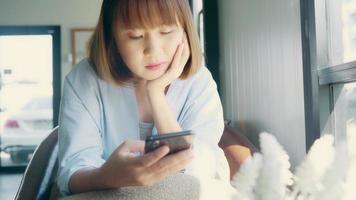 Asian woman using a smartphone  video