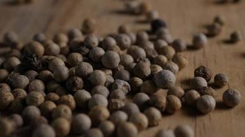 Pepper Grains over Wood Table video