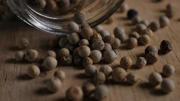 Pepper Grains over Wood Table video