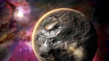 un mundo alienígena gira lentamente frente a la nebulosa de Orión.