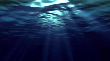 la luce filtra sotto l'acqua blu video